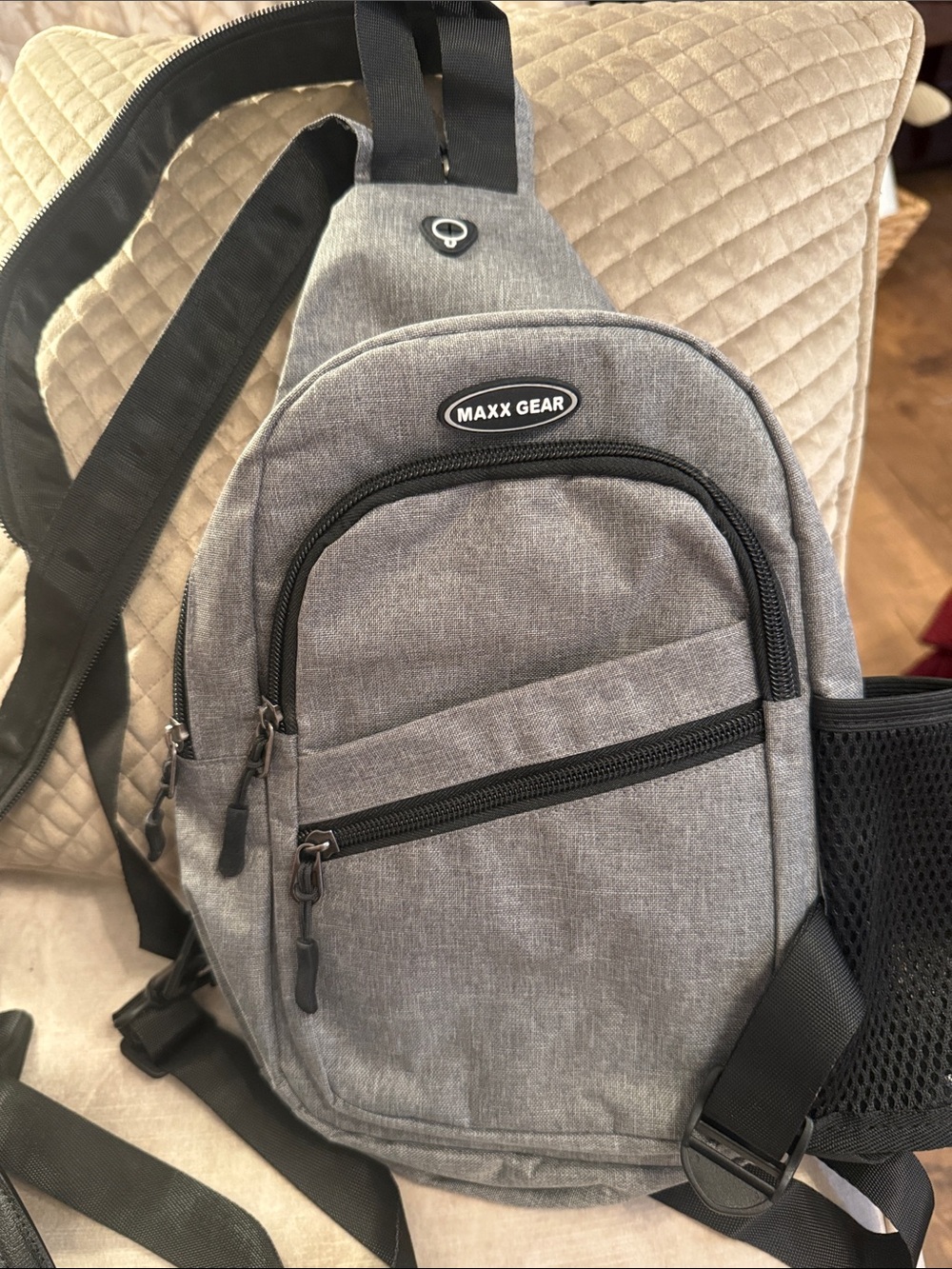Gray Travel Sling Bag with Multiple Zip Pockets